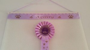 rosette holders, display rosettes, ideas for displaying rosettes, agility show rosettes,rosettes board